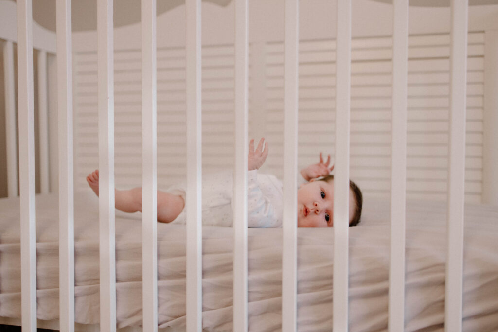 newborn baby in crib